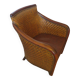 Woven rattan armchair and exotic wood in colonial style, 1980s.