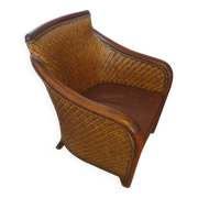 Woven rattan armchair and exotic wood in colonial style, 1980s.