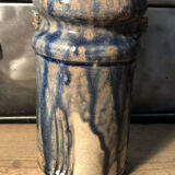 Enamelled pottery vase signed