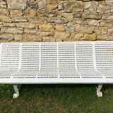 White bench in public garden or park