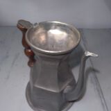 Old tin pitcher