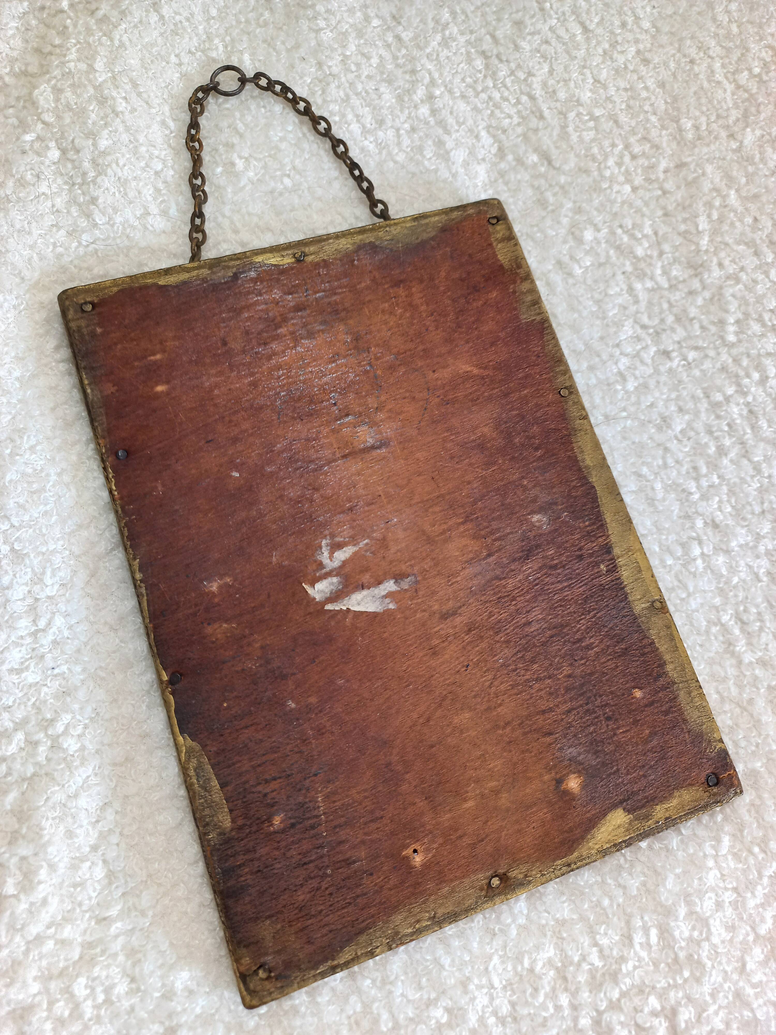 Small vintage mirror in gilded wood, bevelled glass with chain.