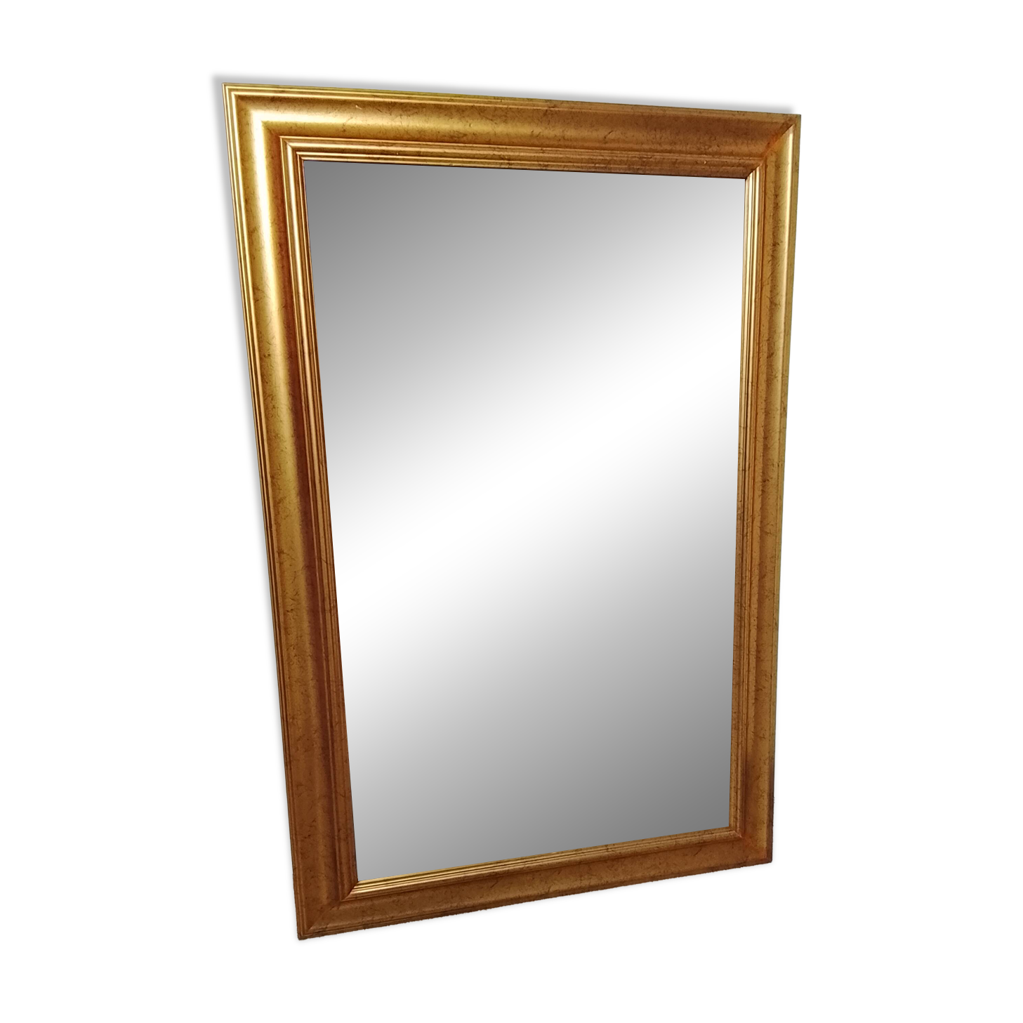 Miroir dans un élégant cadre doré. 84 x 57