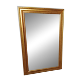 Miroir dans un élégant cadre doré. 84 x 57