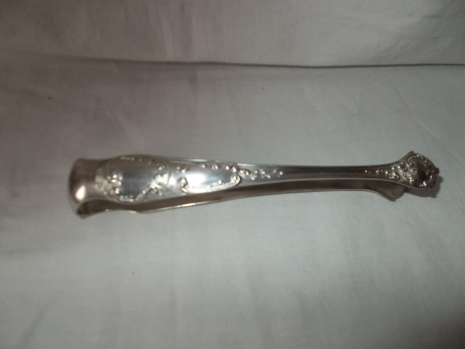 Silver metal sugar pinch