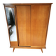 Vintage Scandinavian wardrobe, tapered legs, sliding door.