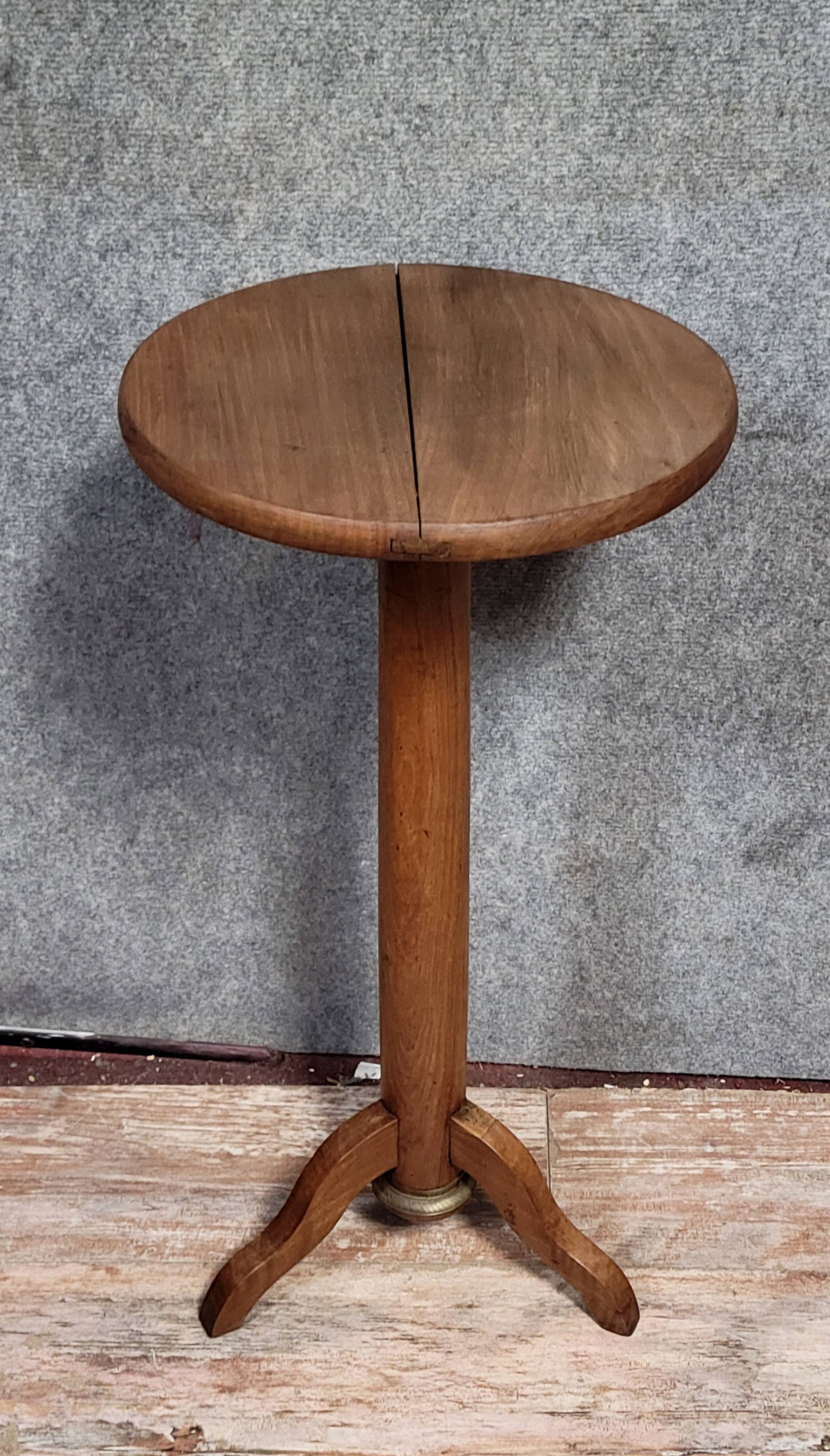 Empire period pedestal table in solid wood and gilt bronze