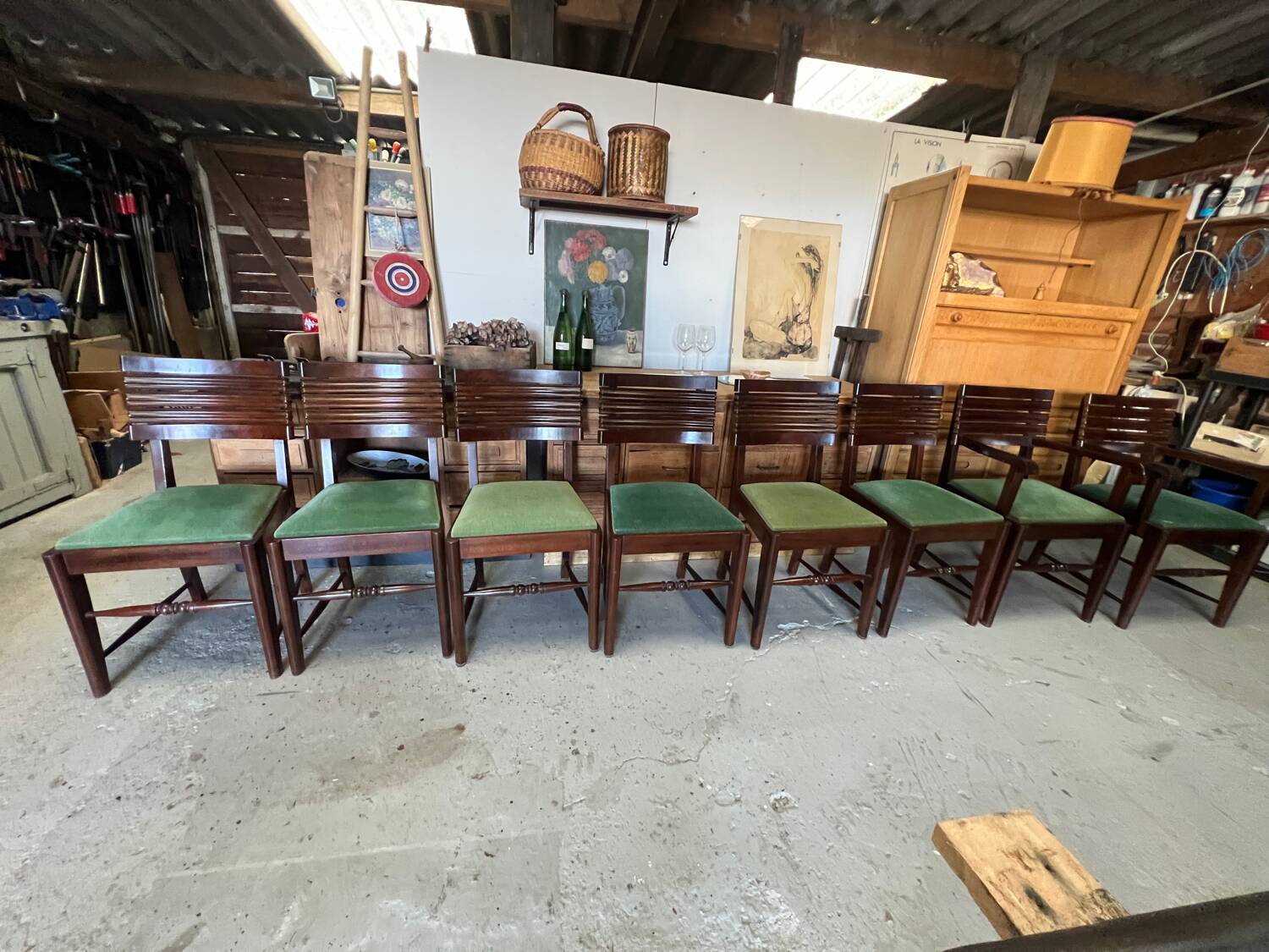 Set of 6 chairs and 2 armchairs by Gaston Poisson