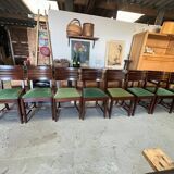 Set of 6 chairs and 2 armchairs by Gaston Poisson