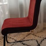 Red suede chairs, Knoll.