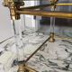 Vintage brass & lucite coffee table — Maison Romeo - Hollywood R