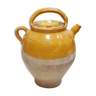 Old gargoulette pot in glazed terracotta