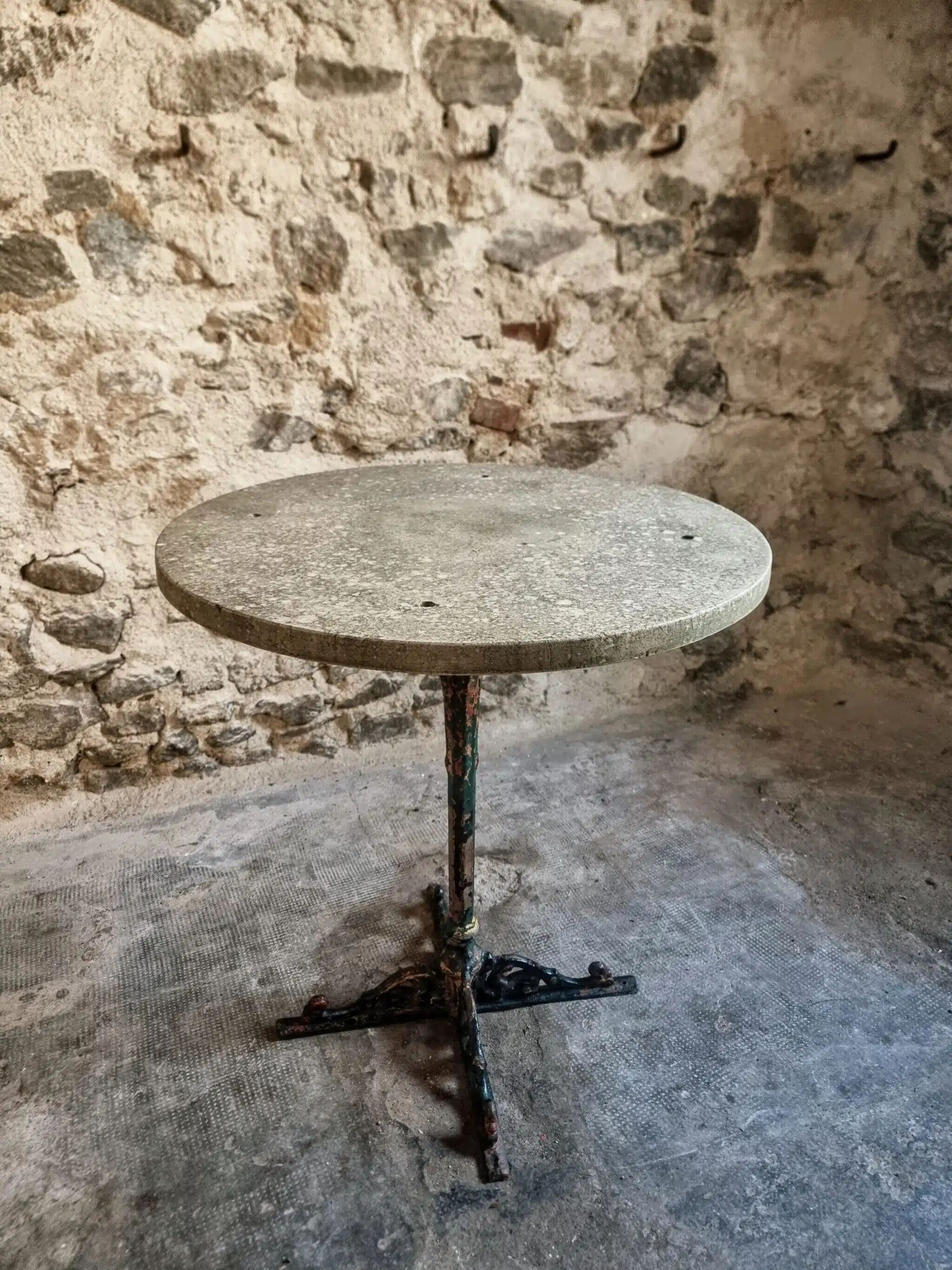 Bistro table / old garden with a cast iron base and stone top, France