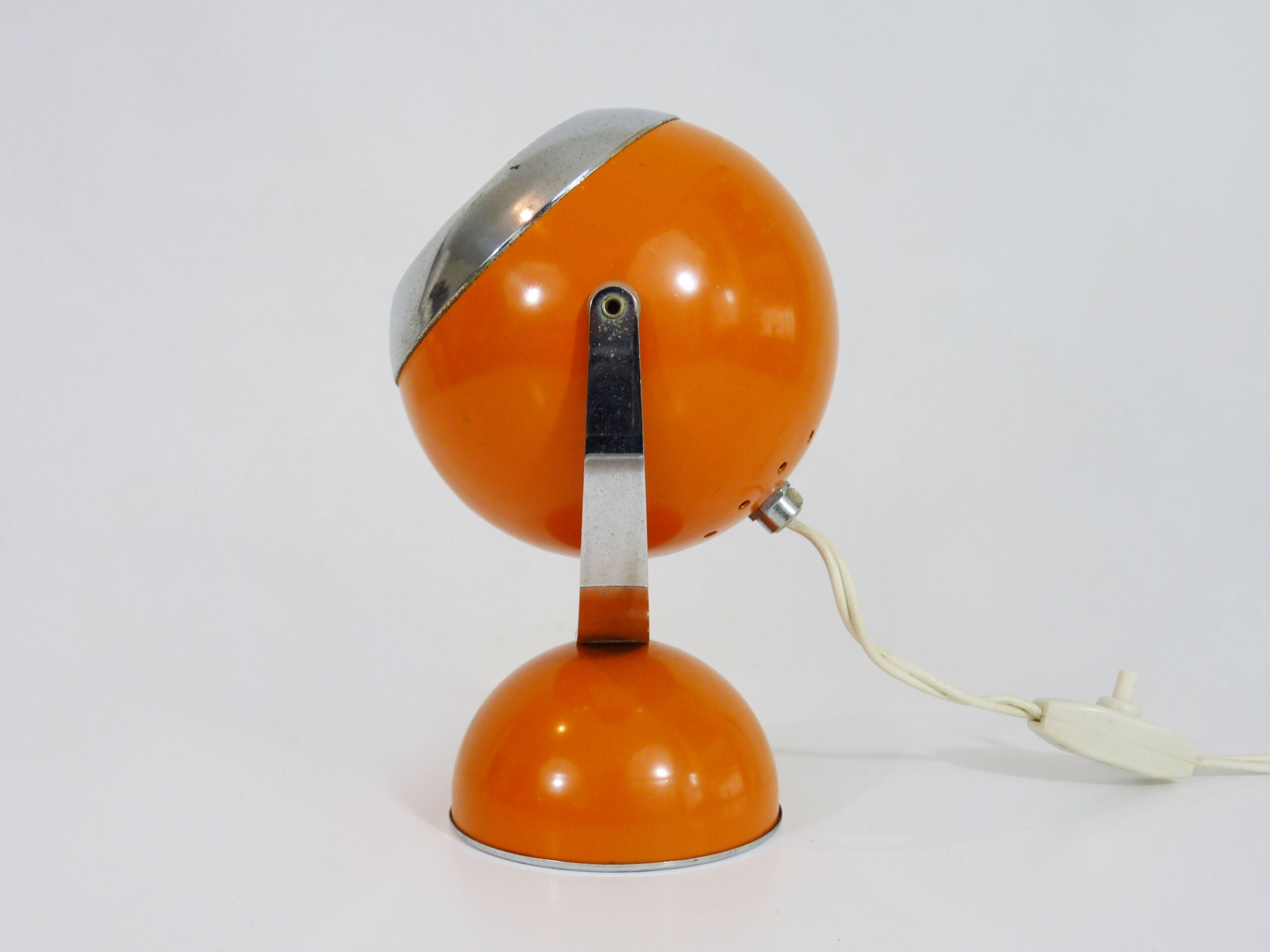 Orange eyeball desk lamp, orientable globe. Year 60 70