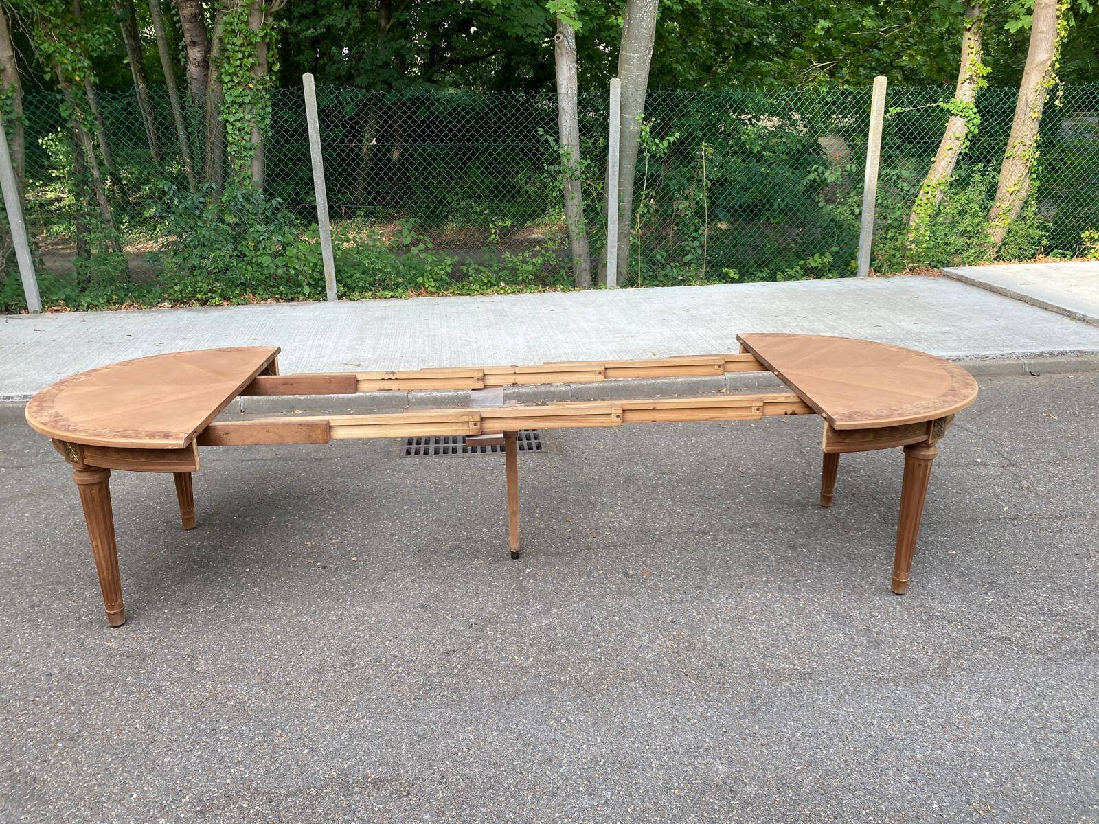 Table de salle à manger ronde extensible signée Jansen Paris 1930