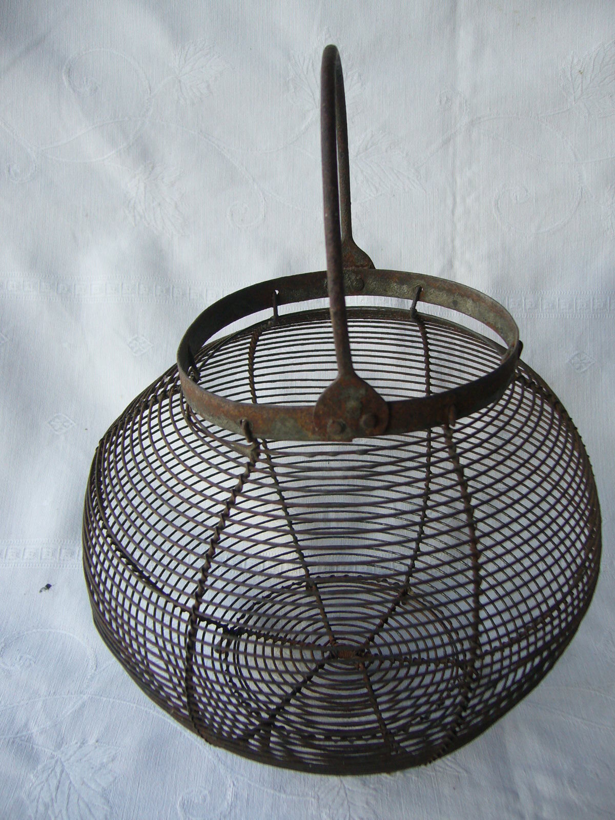 Old metal round salad basket