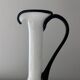 Single flower vase in white and black opaline