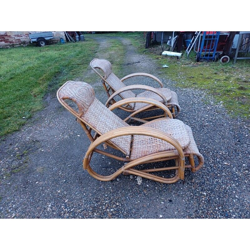 Pair of colonial rattan deck chairs