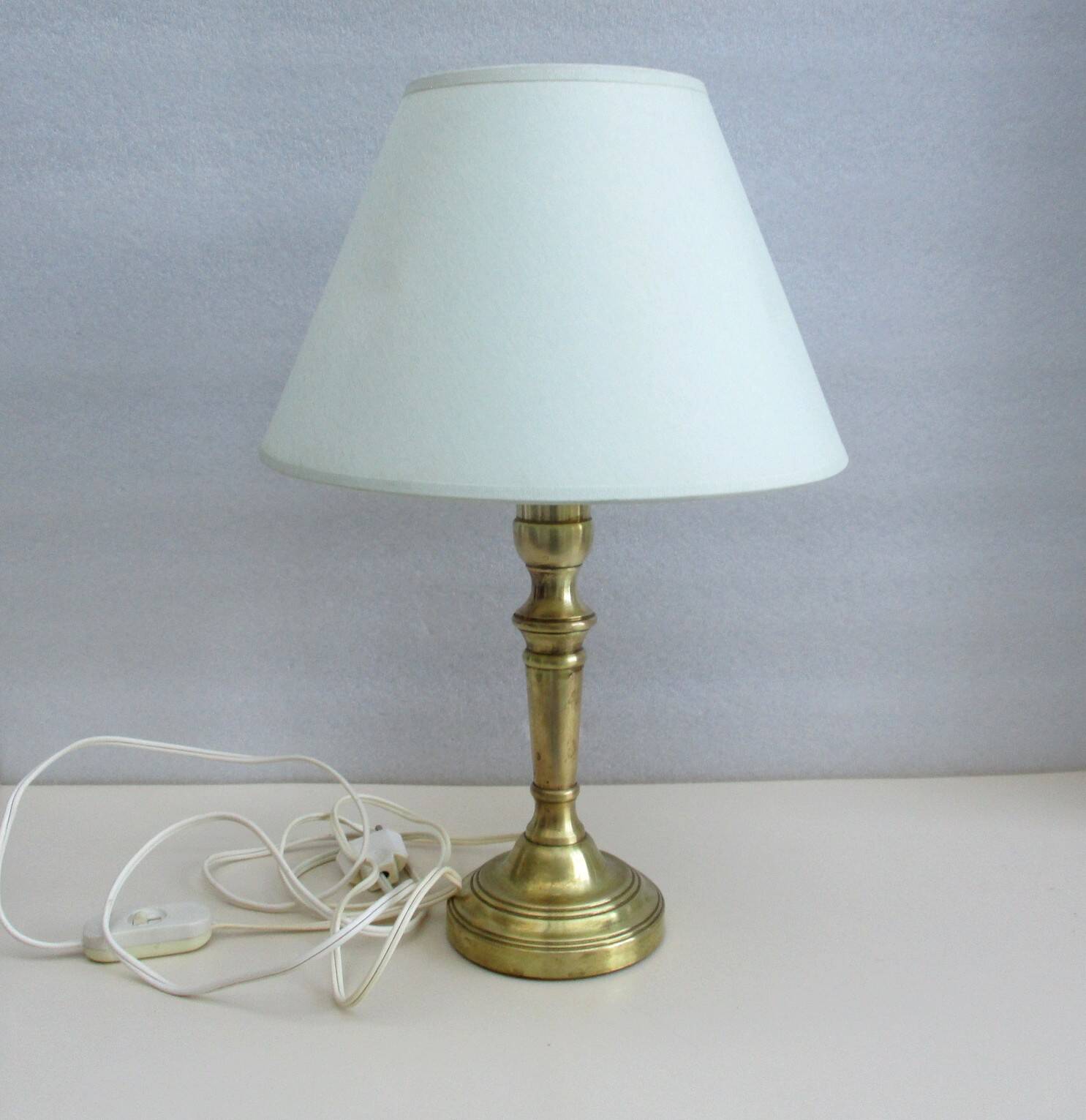 Vintage brass foot lamp