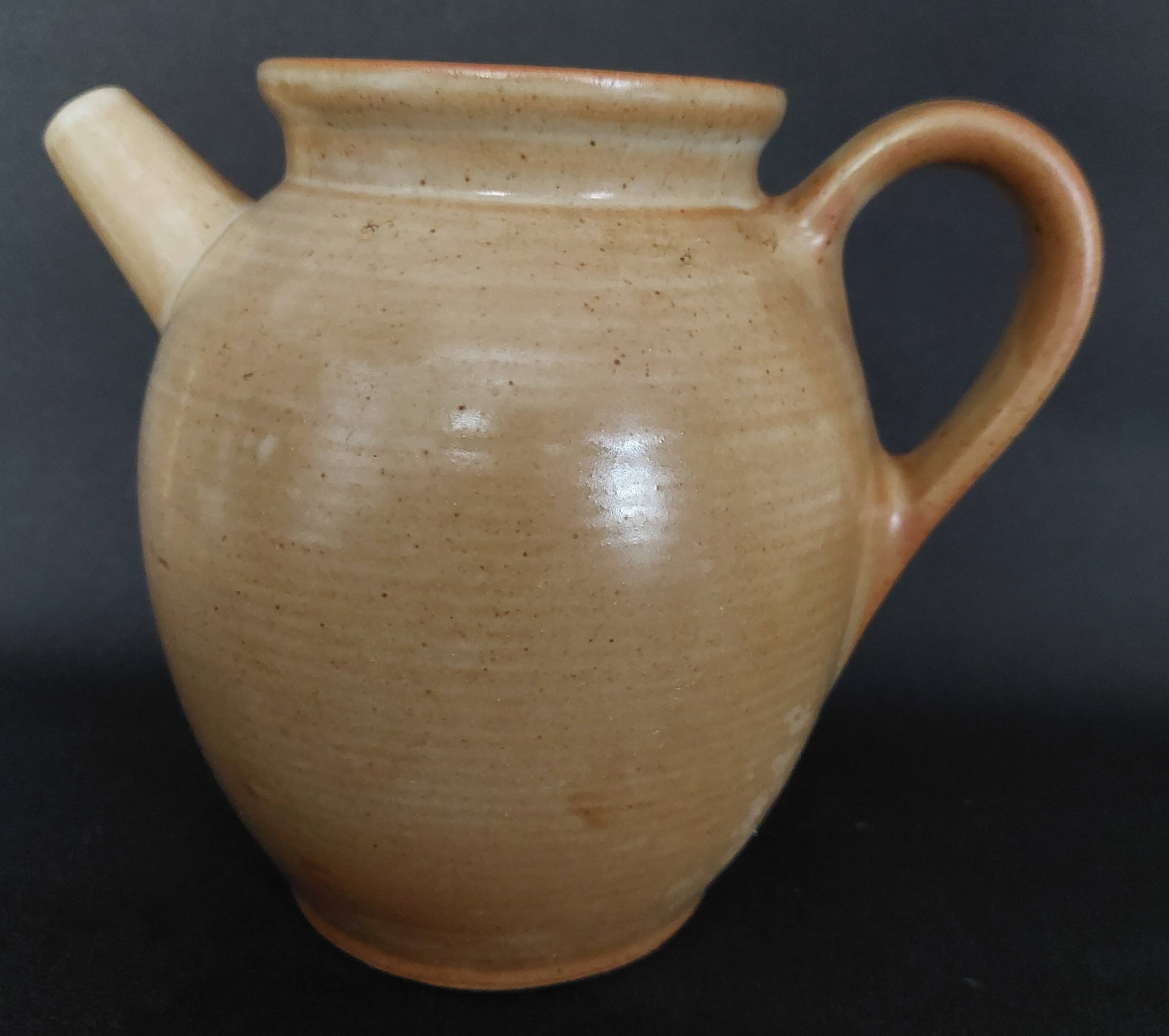 20th century village stoneware goat jug