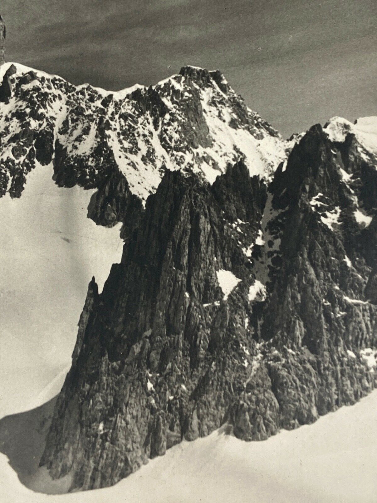 Old photo in black and white mountain summit artistic snow