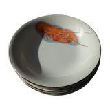 Eight hollow plates decorated with lobsters