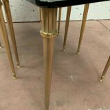 Pull out tables in brass and black glass XX century