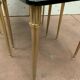 Pull out tables in brass and black glass XX century