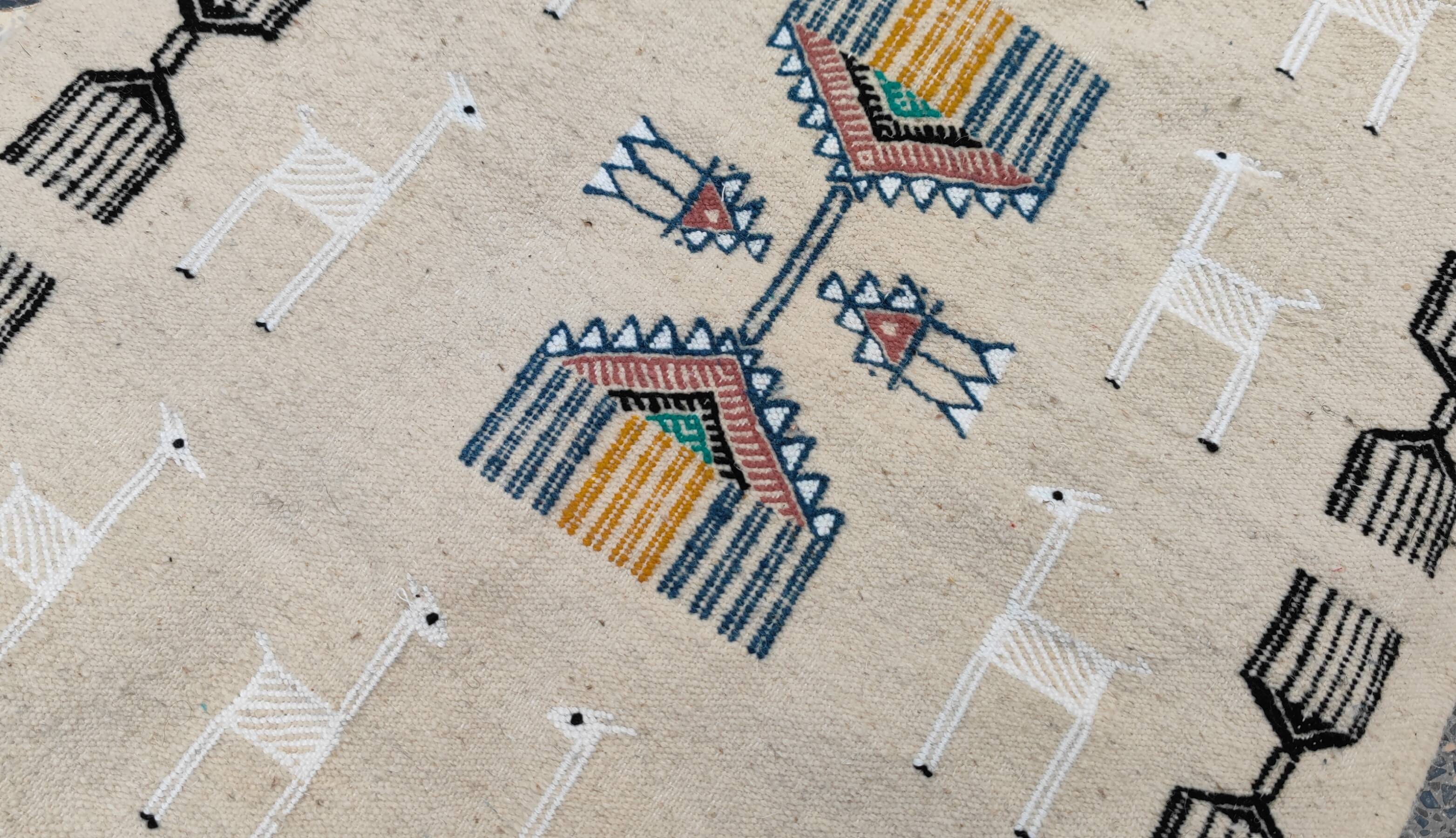 Handwoven kilim rug in natural wool