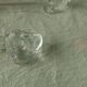 Set of 7 glass knife rests featuring a small duck.