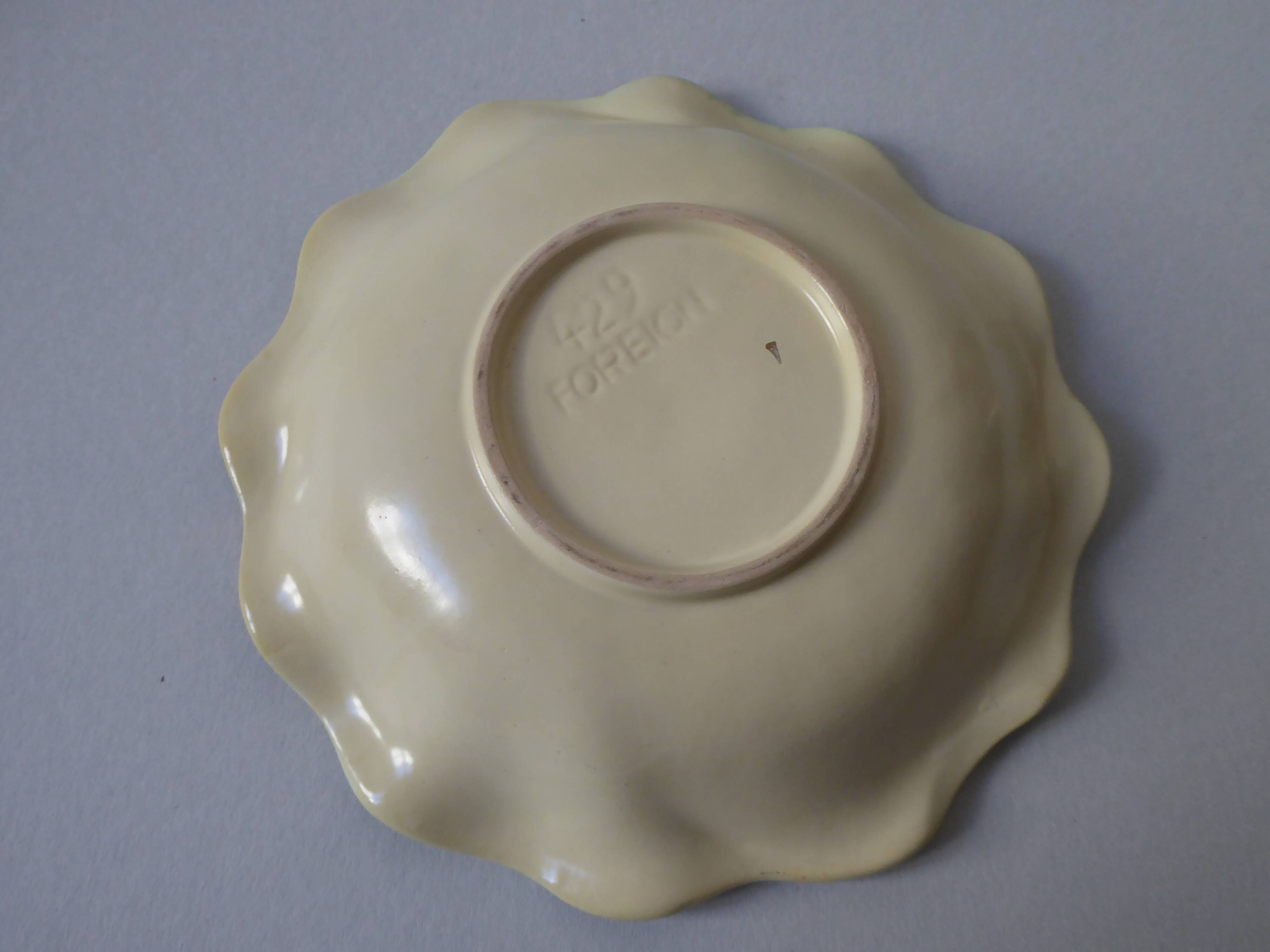 Flower-shaped sandstone dish