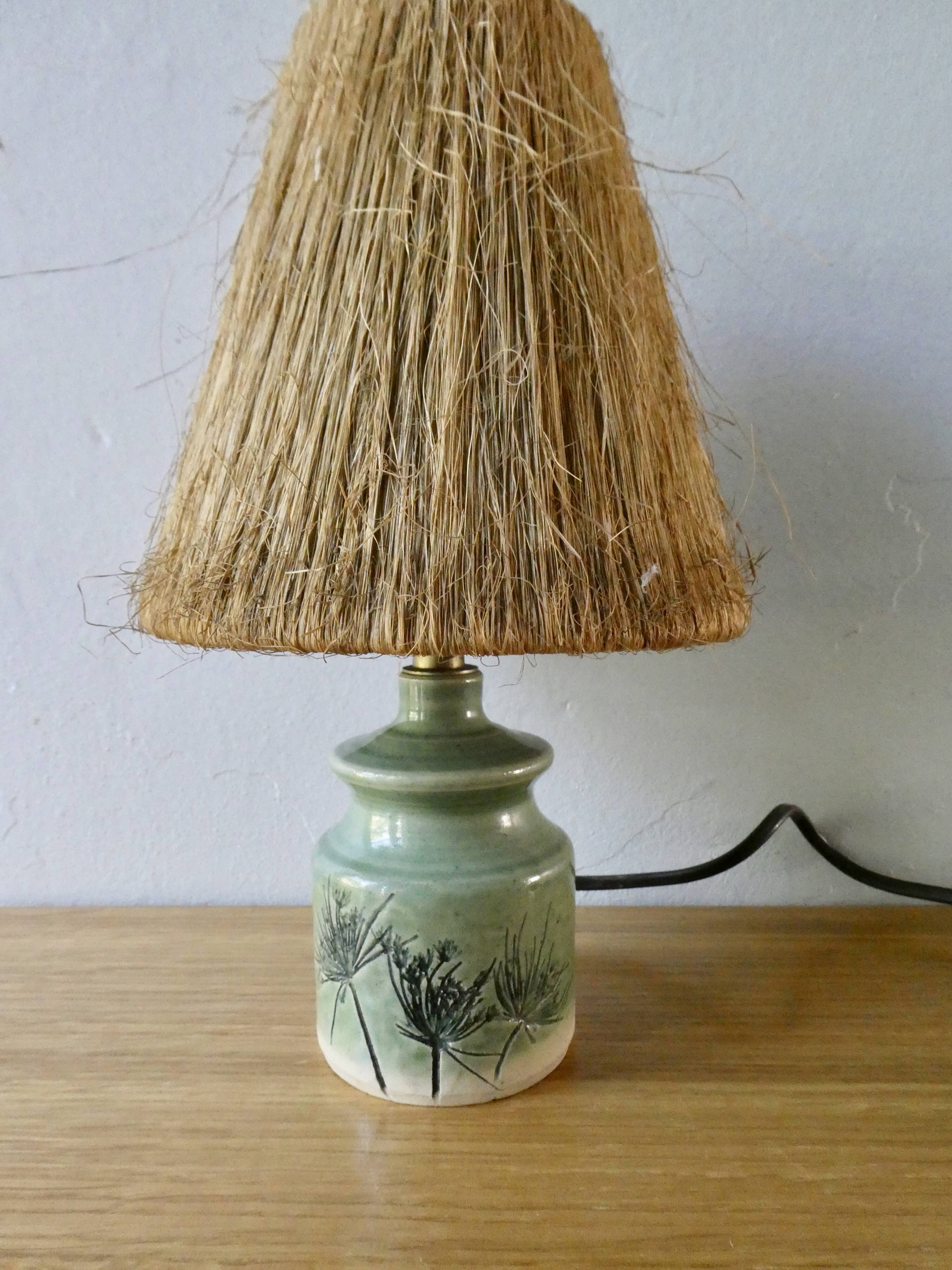 Ceramic lamp, herbarium decoration and fiber blinds