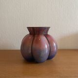 Blown glass vase with metal cage