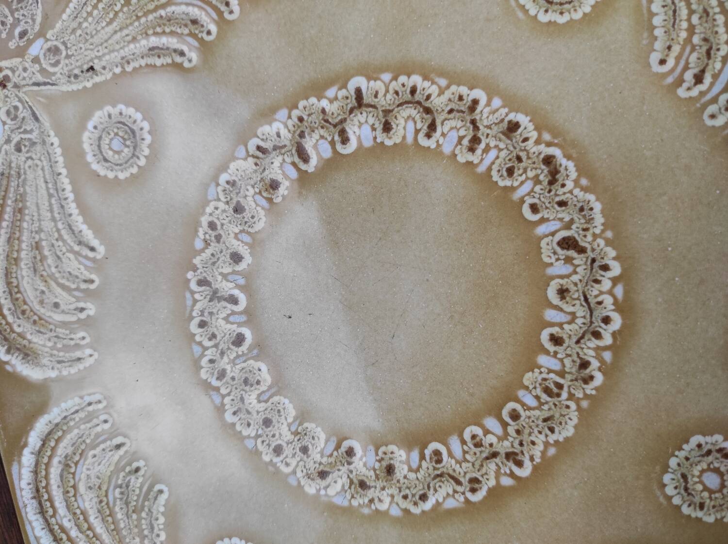 Wooden and ceramic trivet