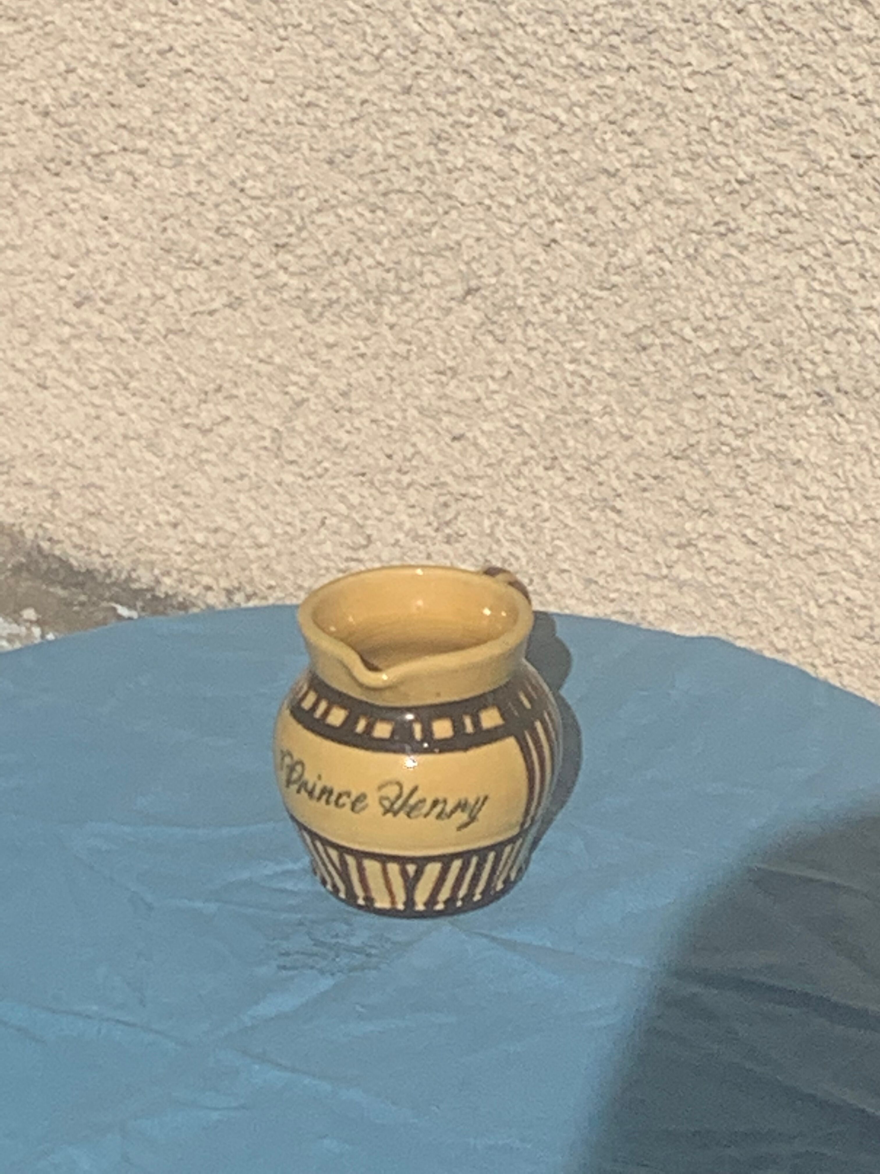 Vintage prince henry enamelled ceramic pitcher