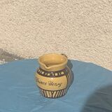 Vintage prince henry enamelled ceramic pitcher