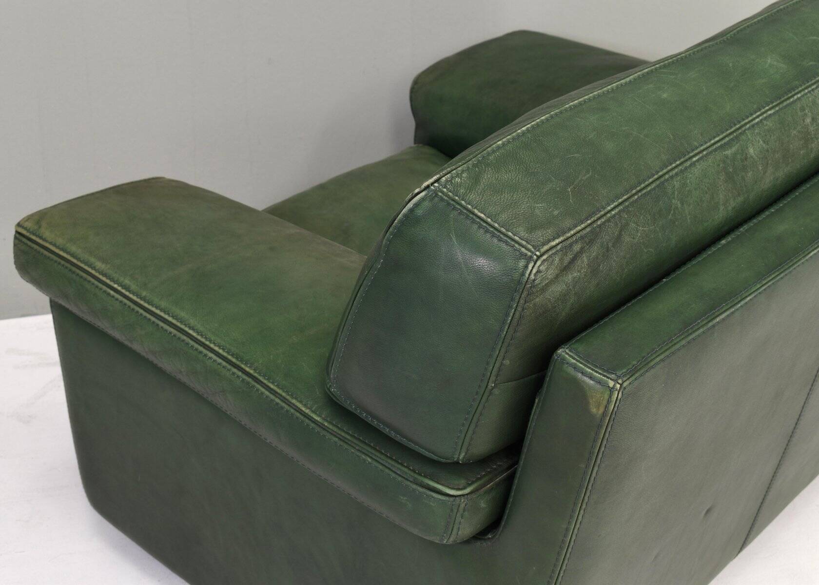 Roche Bobois lounge armchair in original green patinated leather, 1970