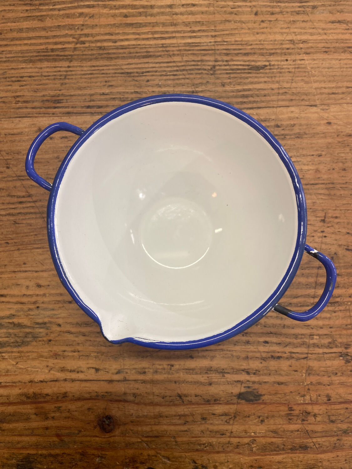 White enamel bowl and blue border