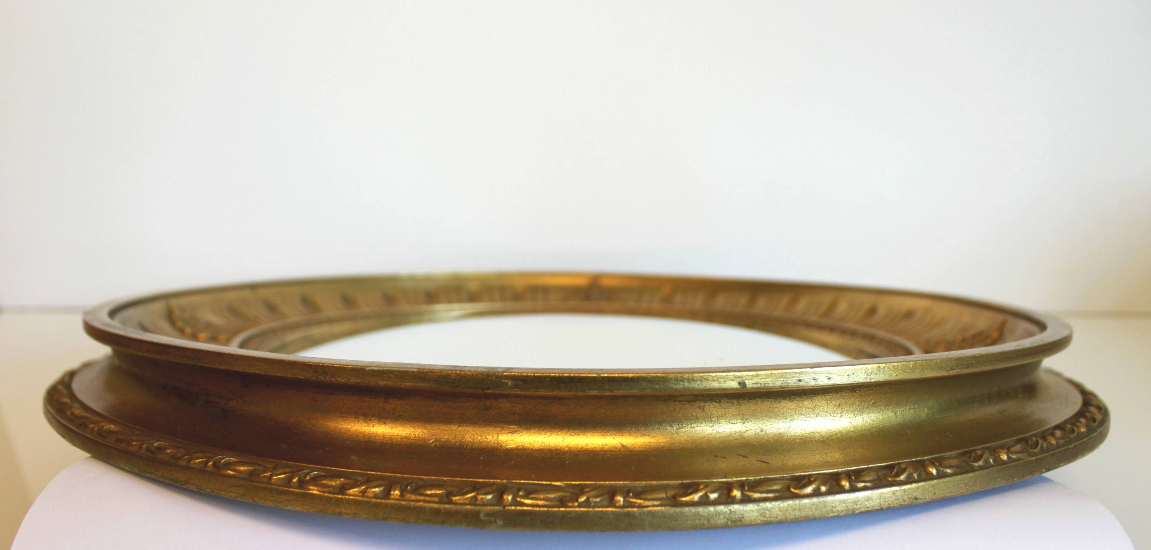 Sun mirror in carved gilded wood, Empire style, 60s.