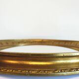 Sun mirror in carved gilded wood, Empire style, 60s.