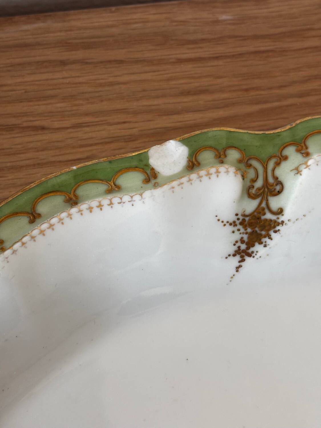 Vintage serving dish with green and gilt defects, Limoges porcelain
