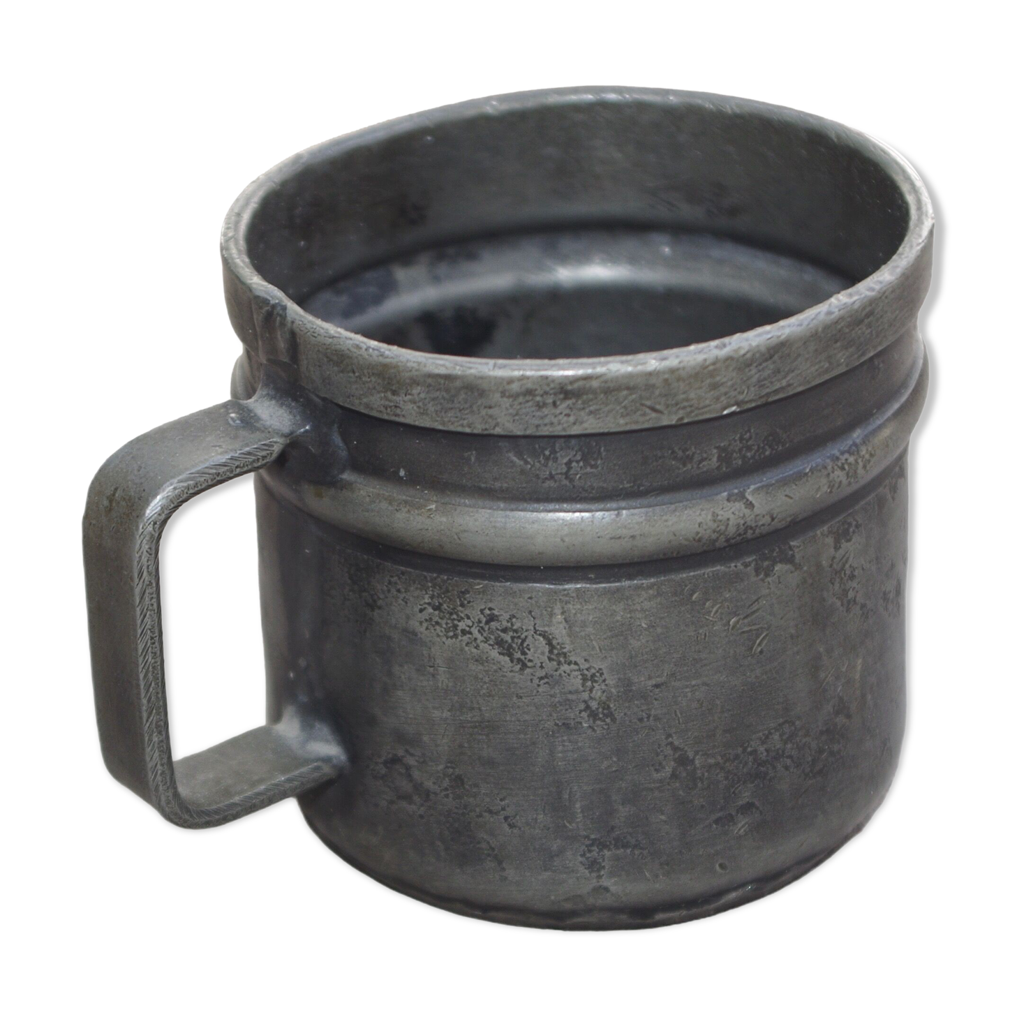 Old tin cup