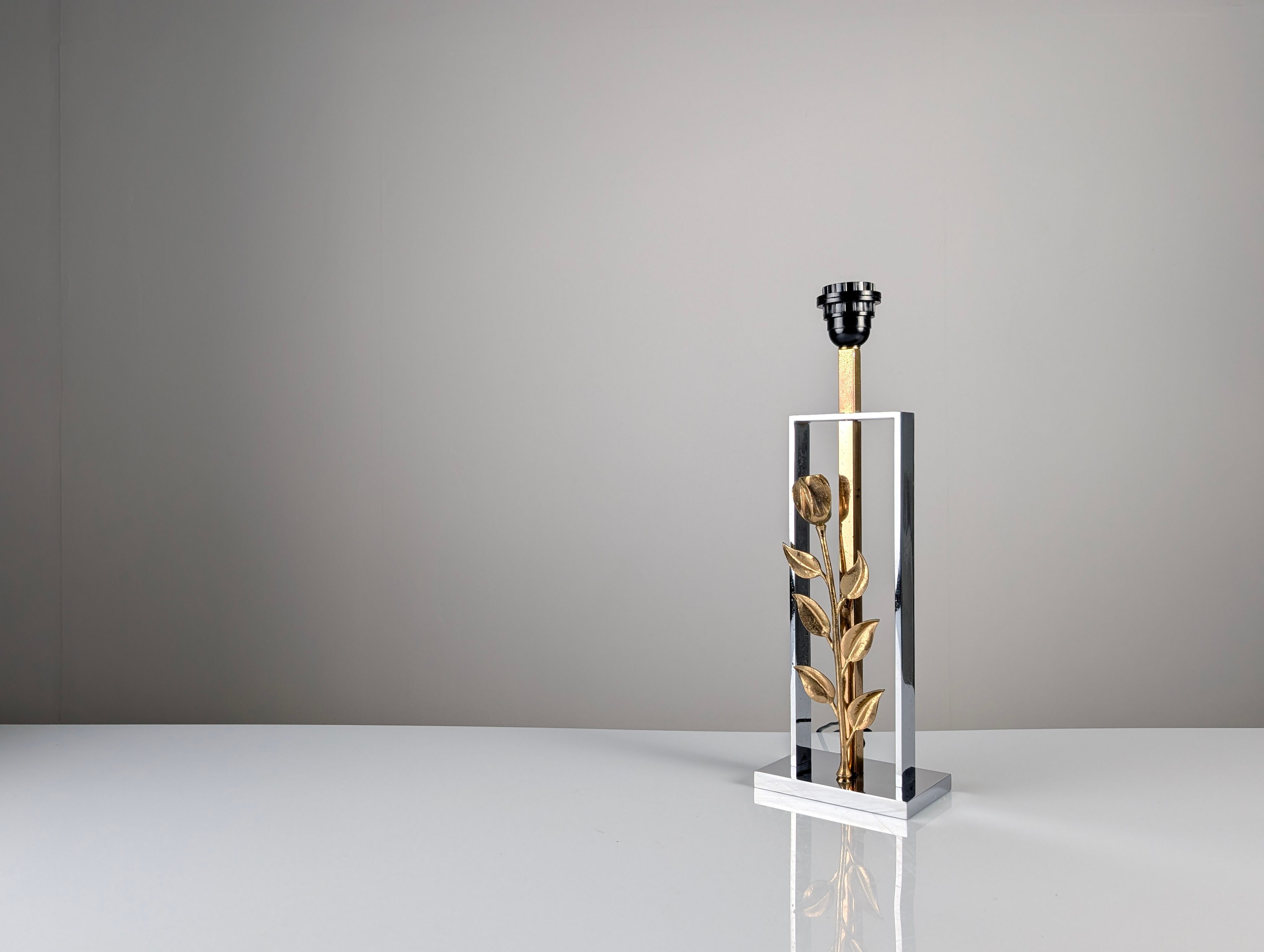 Maison Charles table lamp in chrome and gilt bronze with rose, France, 1970s