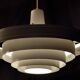 Saturn pendant light in satin white lacquered metal