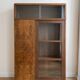Antique Art Deco display cabinet in wood and walnut veneer.
