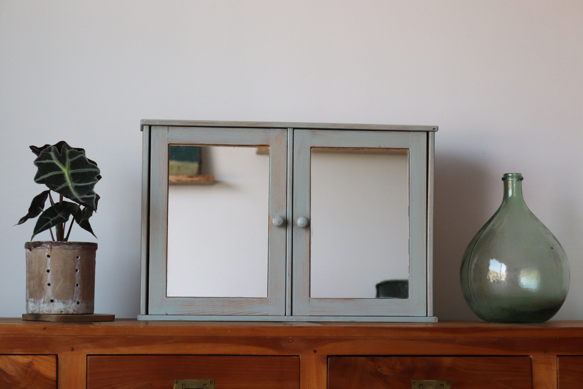 Greyed wood medicine cabinet