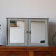 Greyed wood medicine cabinet