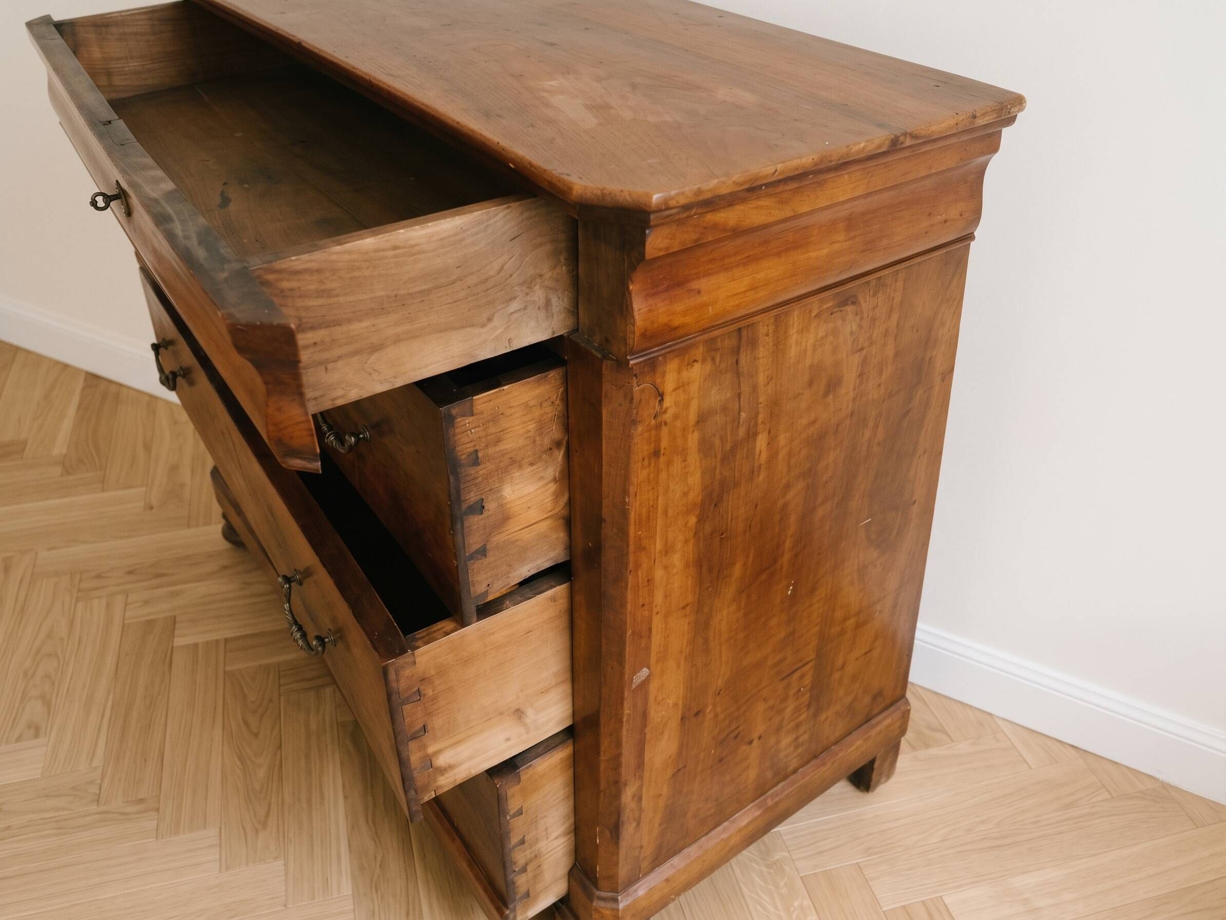 Antique walnut chest of drawers