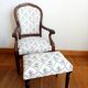 Voltaire armchair and its ottoman