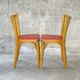 Pair of red Baumann skai chairs 1960